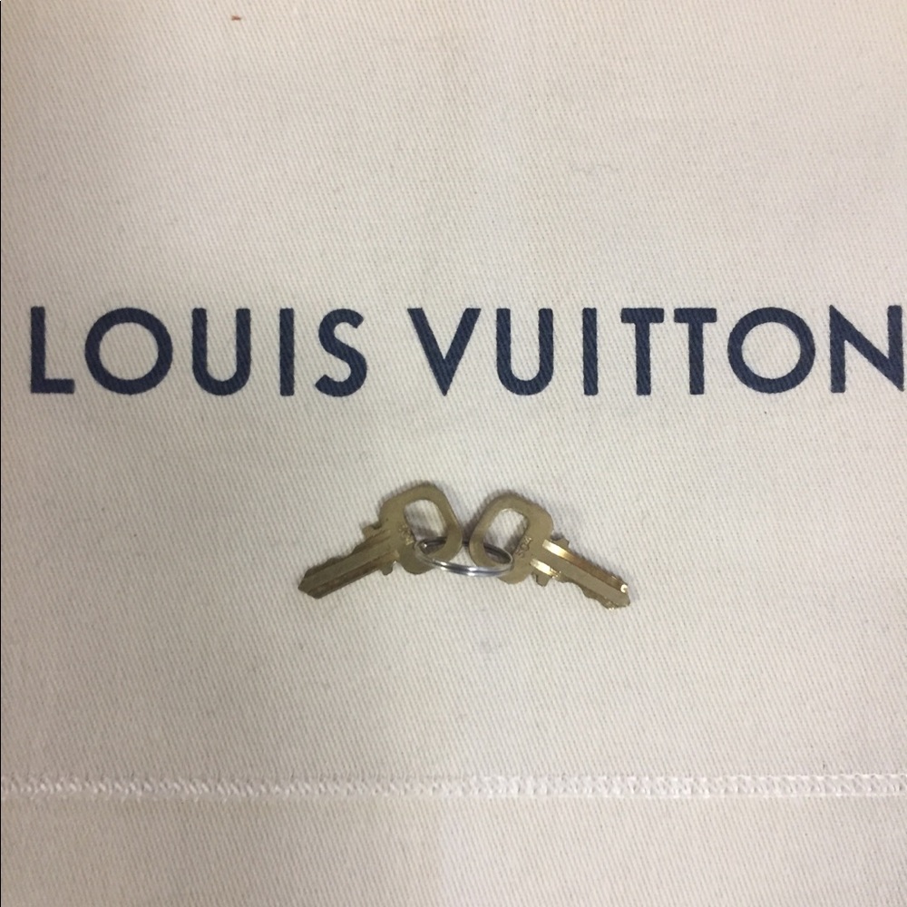 Two keys to Louis Vuitton lock 304